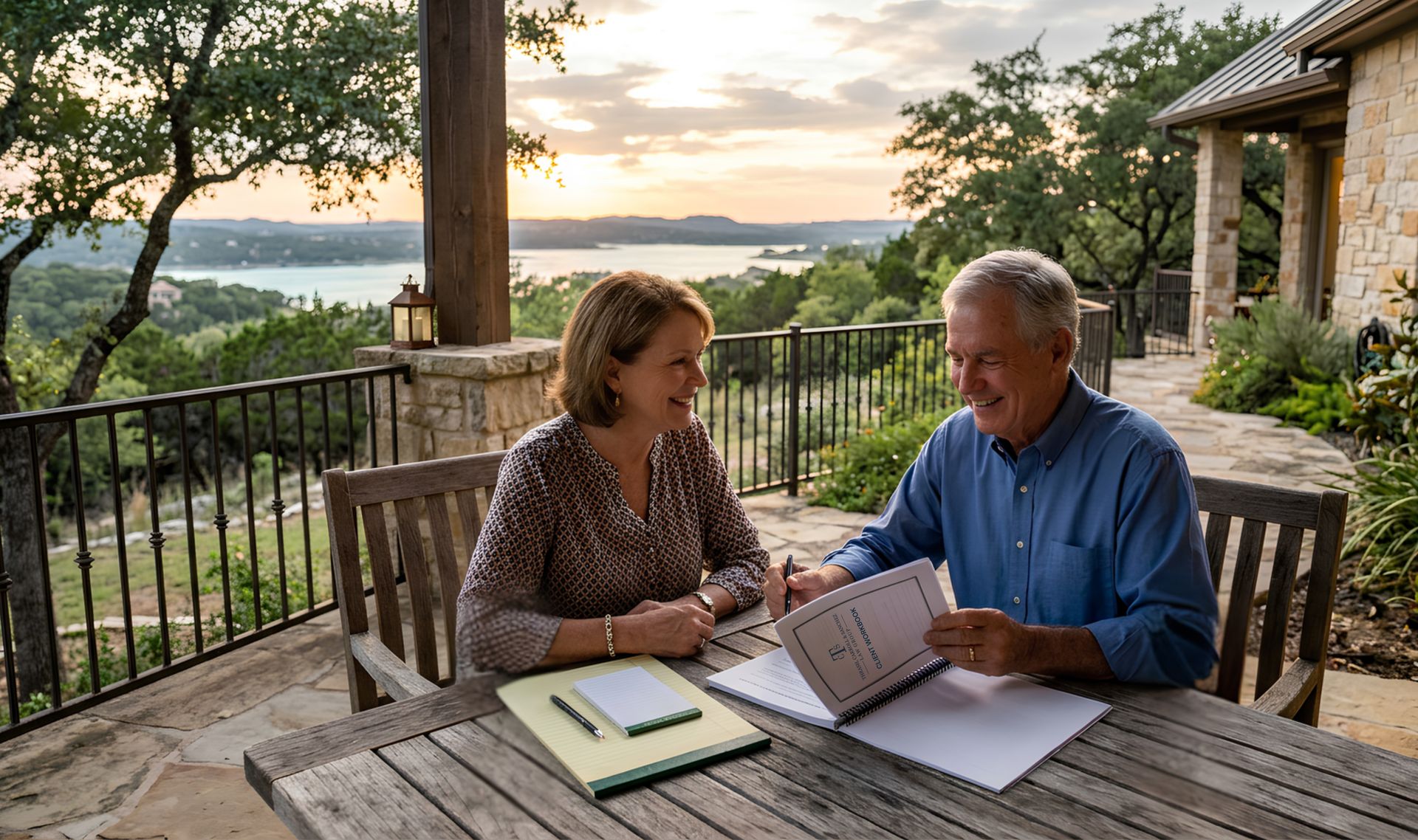A couple reviewing their estate plan together on a Hill Country porch overlooking Lake Travis